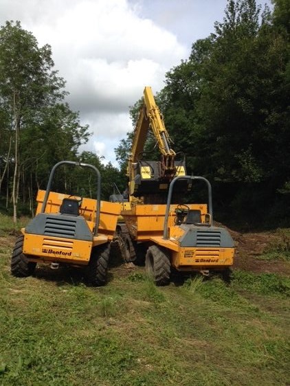 Screening material directly into dumper trucks